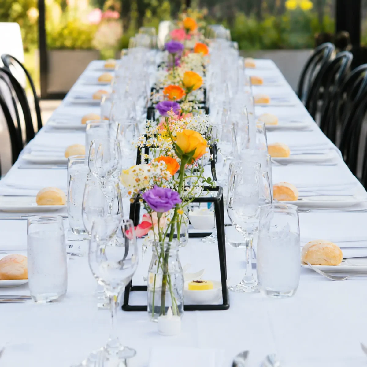 Wedding Reception Table Flowers Melbourne Colourful wedding reception table flowers arranged in bud vases
