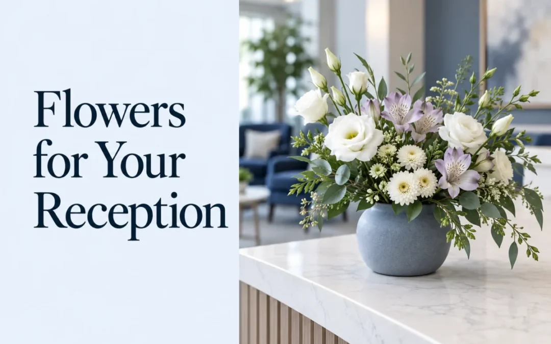 White and pale lilac flowers in a blue vase on a reception counter, beside the words “Flowers for Your Reception”